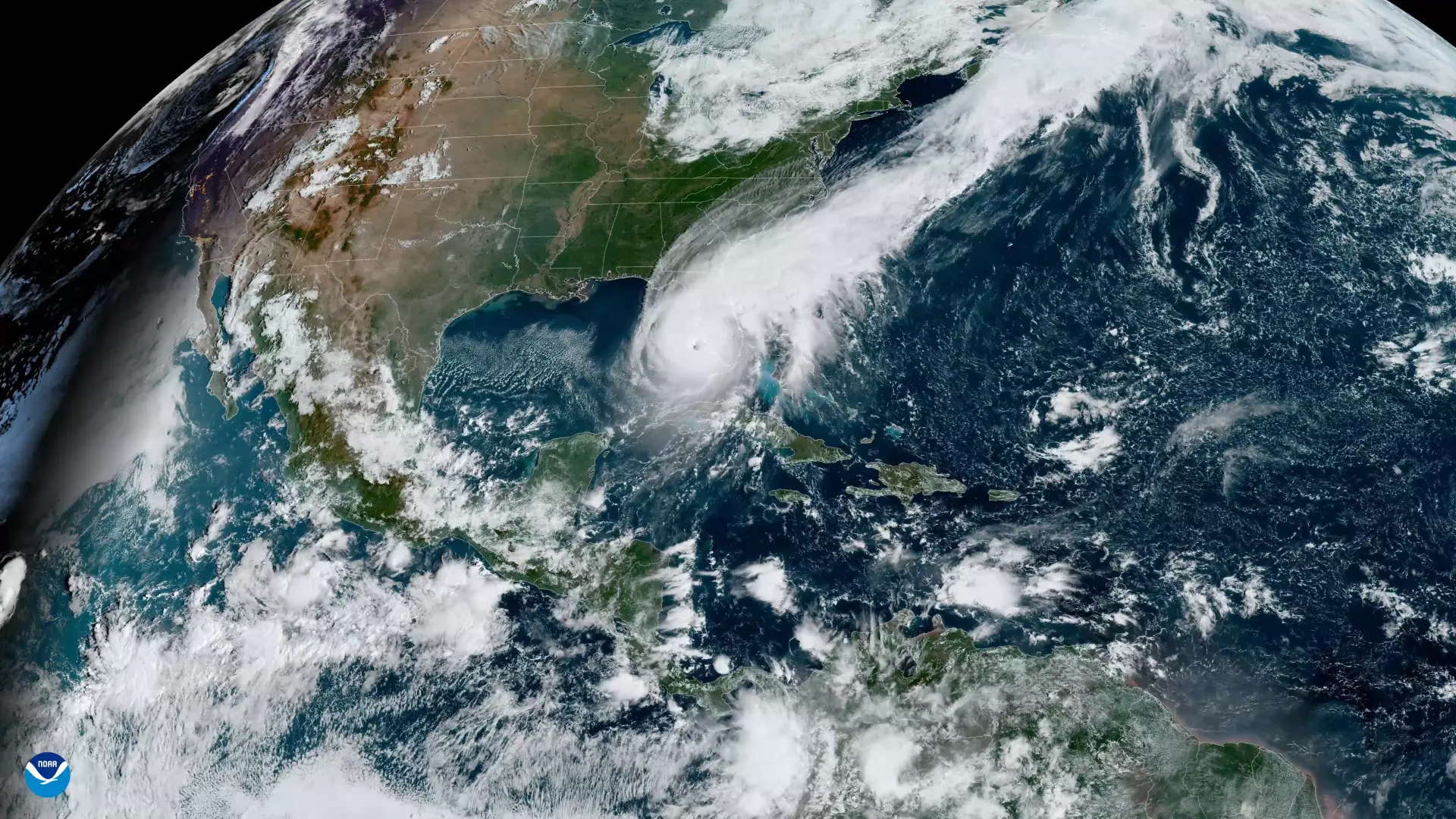 Satellite view of a hurricane approaching Florida — 24/7 emergency storm response by American Roofing & Construction